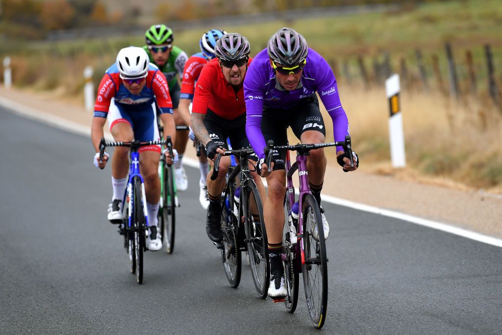 VINUESA SPAIN OCTOBER 22 Angel Madrazo of Spain and Team Burgos BH Valentin Ferron of France and Team Total Direct Energie Paul Ourselin of France and Team Total Direct Energie Hector Saez Benito of Spain and Team Caja RuralSeguros RGA Breakaway during the 75th Tour of Spain 2020 Stage 3 a 1661km stage from Lodosa to La Laguna Negra Vinuesa 1735m lavuelta LaVuelta20 La Vuelta on October 22 2020 in Vinuesa Spain Photo by Justin SetterfieldGetty Images
