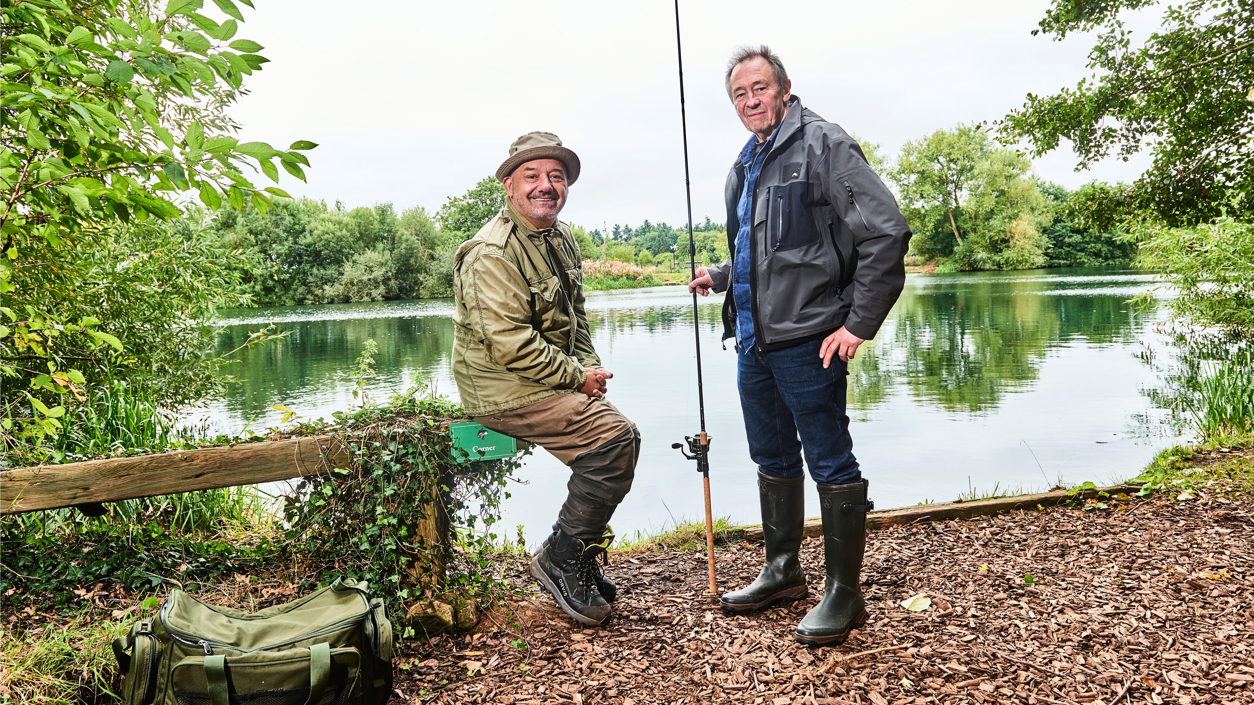 Bob Mortimer and Paul Whitehouse in fishing gear at Carp Lake in Shropshire for Gone Fishing