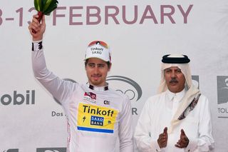 Peter Sagan wears the white jersey on the podium following stage 2 in Qatar.