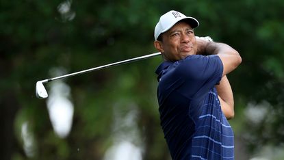 Tiger Woods of The United States plays his tee shot on the fourth hole during the second round of the 2023 Masters Tournament at Augusta National Golf Club