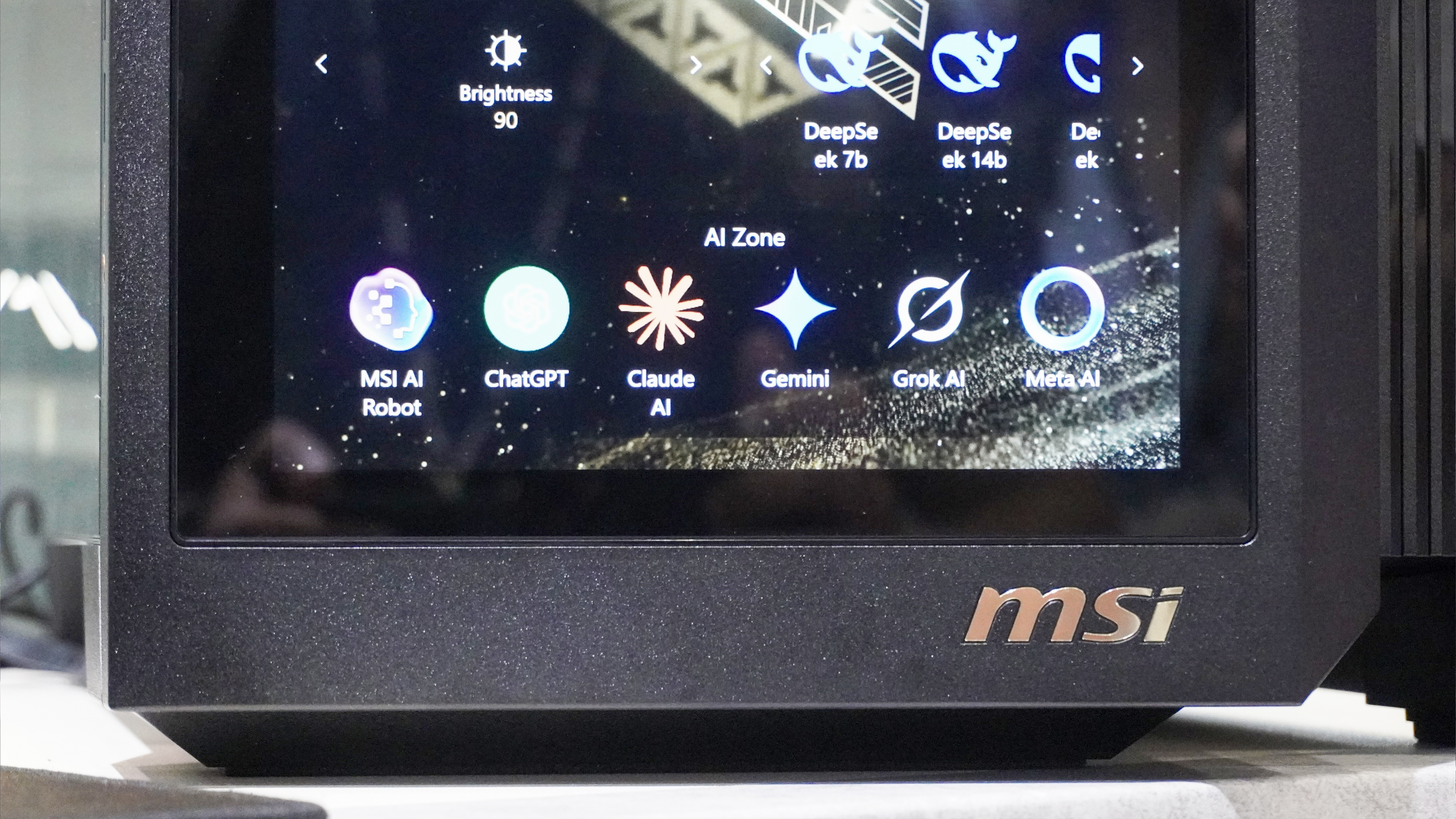 The new AI Zone shortcuts on the MSI Meg Vision X AI's front display