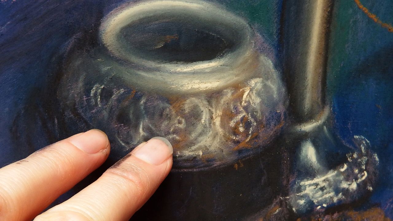 Gently soften highlights with fingers