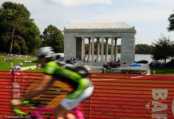 Racers warm up in front of the pavilion on the lake
