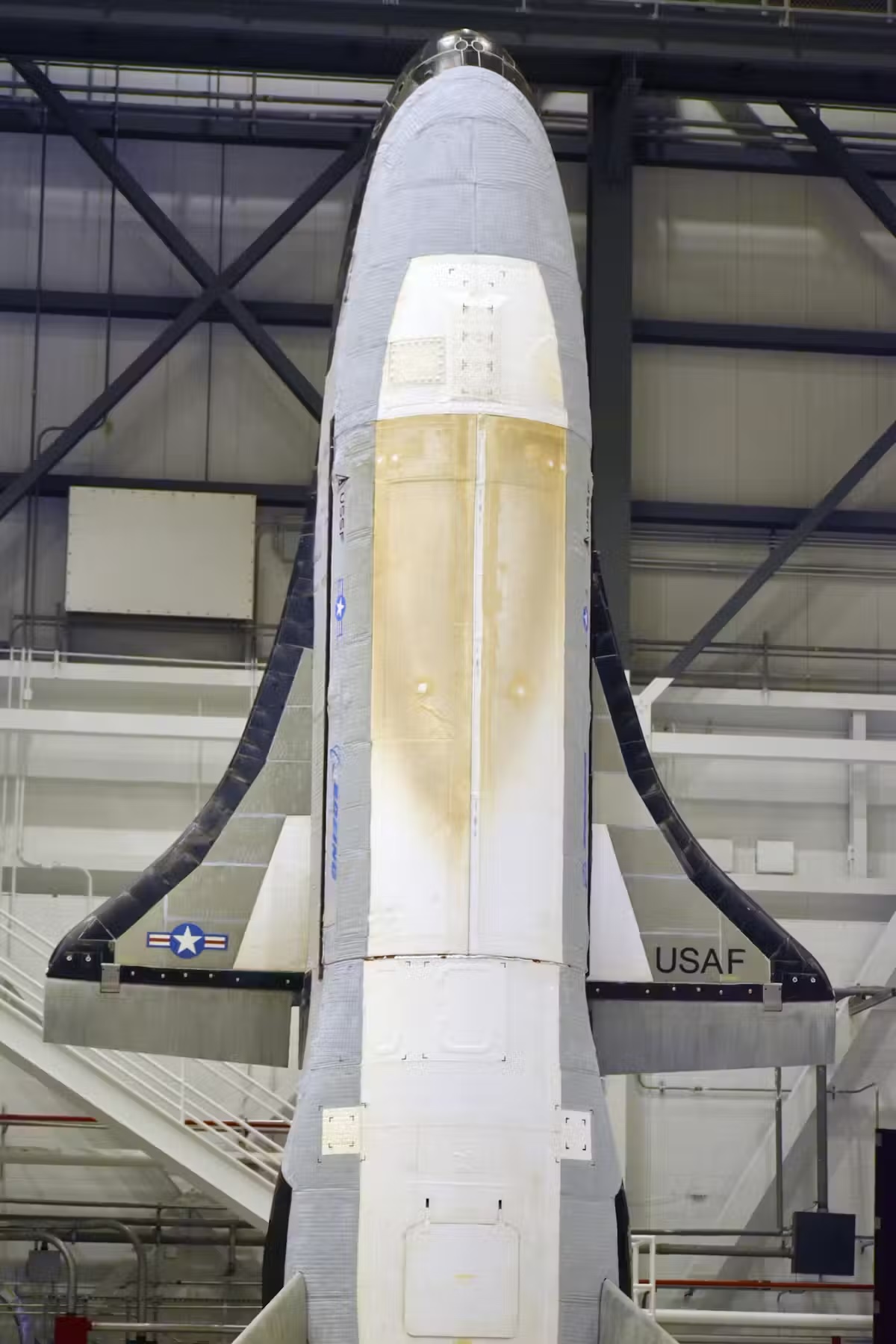 an image of the X-37B space plane in a hangar