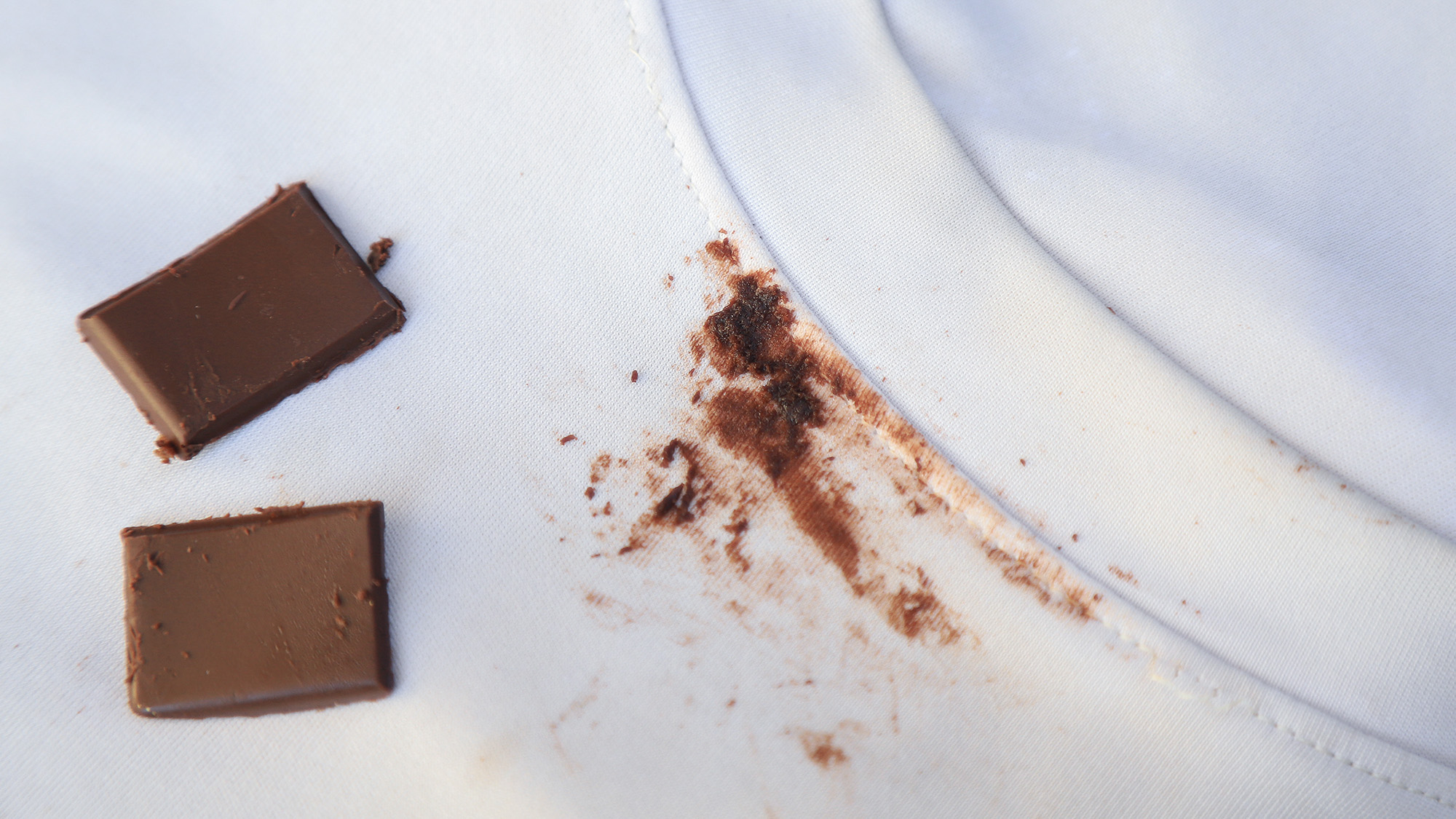 Chocolate stain on white t-shirt