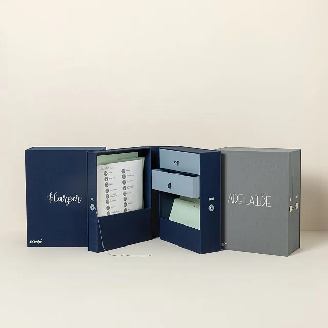 A Savor travel library filled with papers and travel ephemera