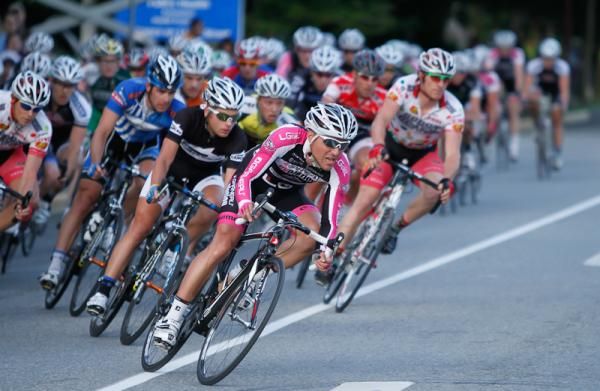 Jeff Werner (GarneauEvolution) leads Christian Meier (UHC) through corner 1 as they chase the 4 man breakaway