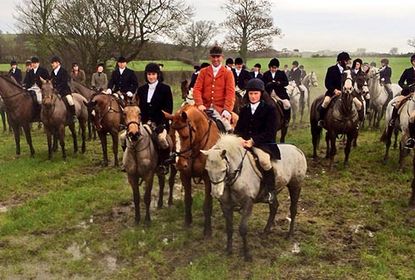 Jockeys out hunting on ponies on Boxing Day