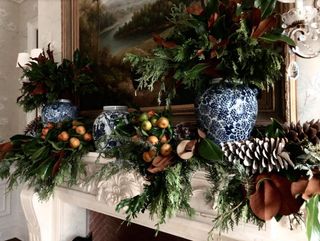 Christmas foliage ideas with stockings and fireplace