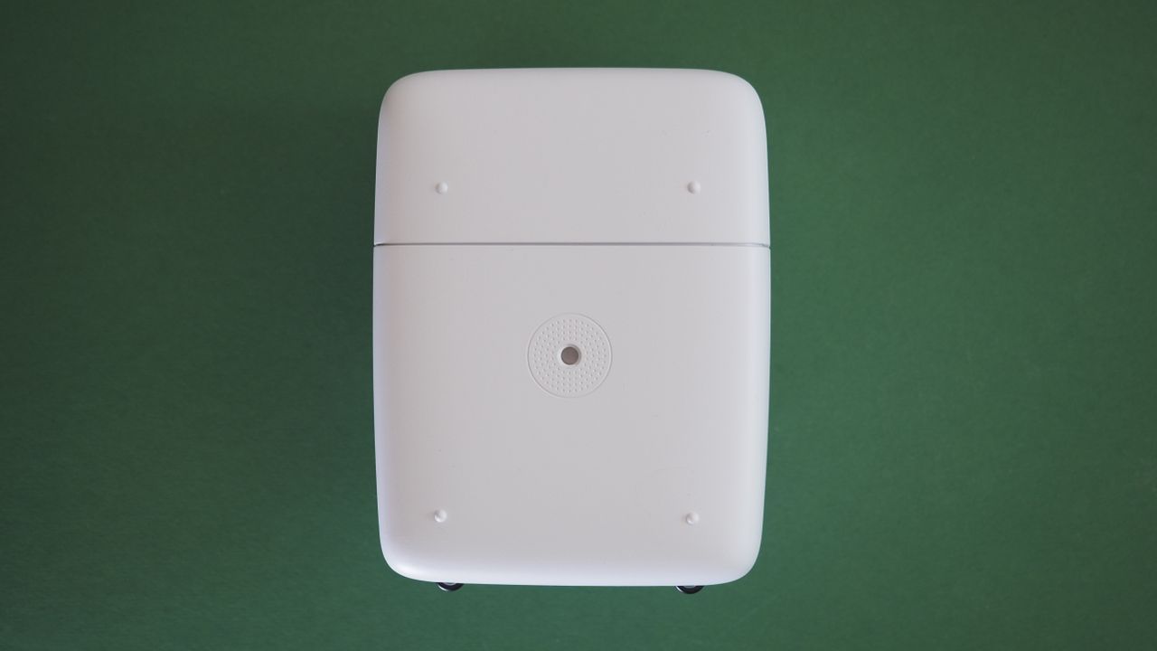 Polaroid Flip camera on a green surface