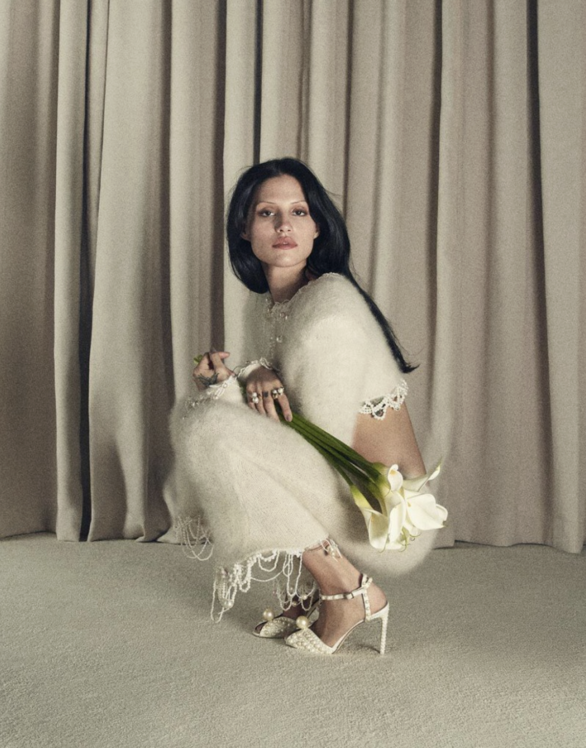 Jimmy Choo model wears bridal accessories