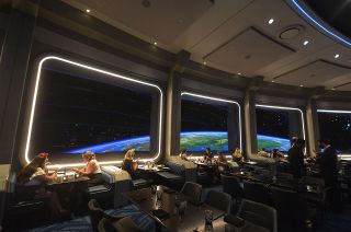 The new Space 220 restaurant, part of the Mission: SPACE pavilion at Walt Disney World's Epcot Center in Florida, provides guests the chance to dine on a space station in Earth orbit.