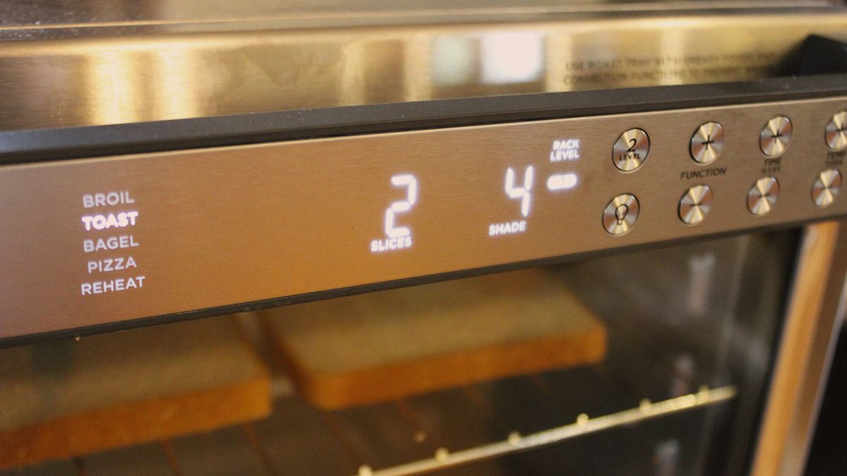 Ninja Prestige Smart XL Air Fryer &amp; Countertop Oven being tested in a white kitchen