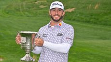 Max Homa with the trophy after his win in the 2022 Wells Fargo Championship