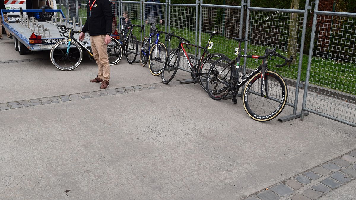 Plenty of bikes were damaged during the race and were waiting to be collected from the broom wagon at the finish