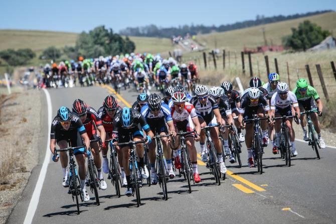 A groups of riders begins to split off of the field