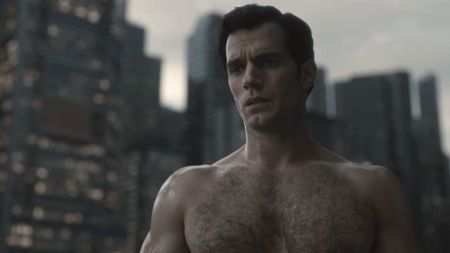 Henry Cavill shirtless in front of the Superman monument in Zack Snyder's Justice League. 