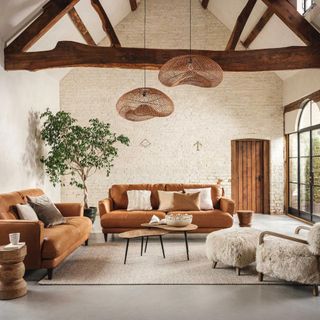 Brown leather sofa in a neutral living room