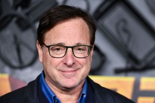 Bob Saget attends the red carpet premiere & party for Peacock's new comedy series "MacGruber" at California Science Center on December 08, 2021 in Los Angeles, California. 