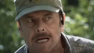 Jack Nicholson in a baseball cap speaking vigorously in The Pledge