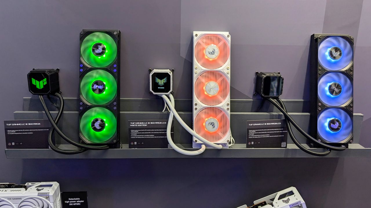Asus TUF Gaming LCD III AIO coolers mounted to the wall at Computex 2025