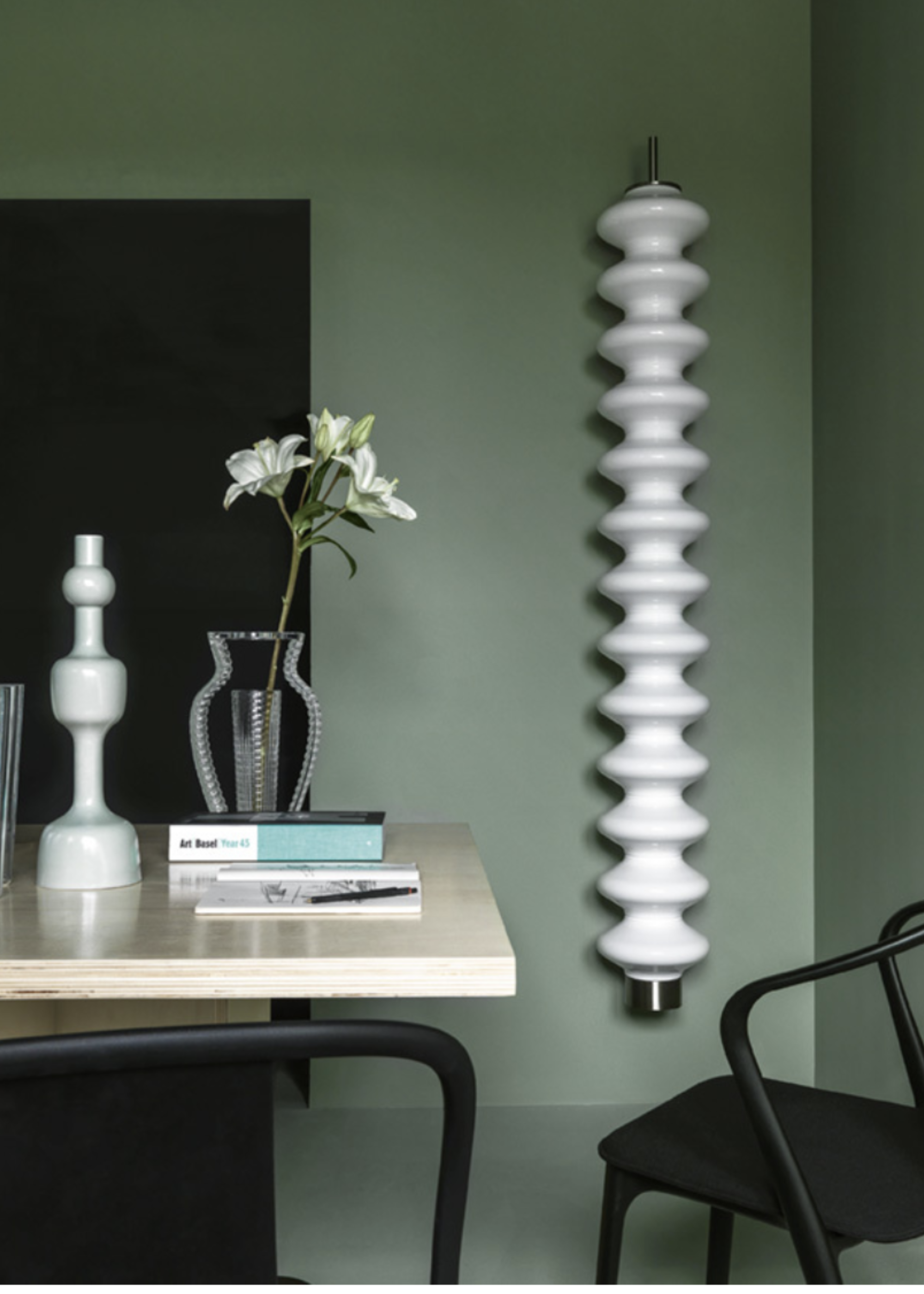 Wall-mounted white radiator
