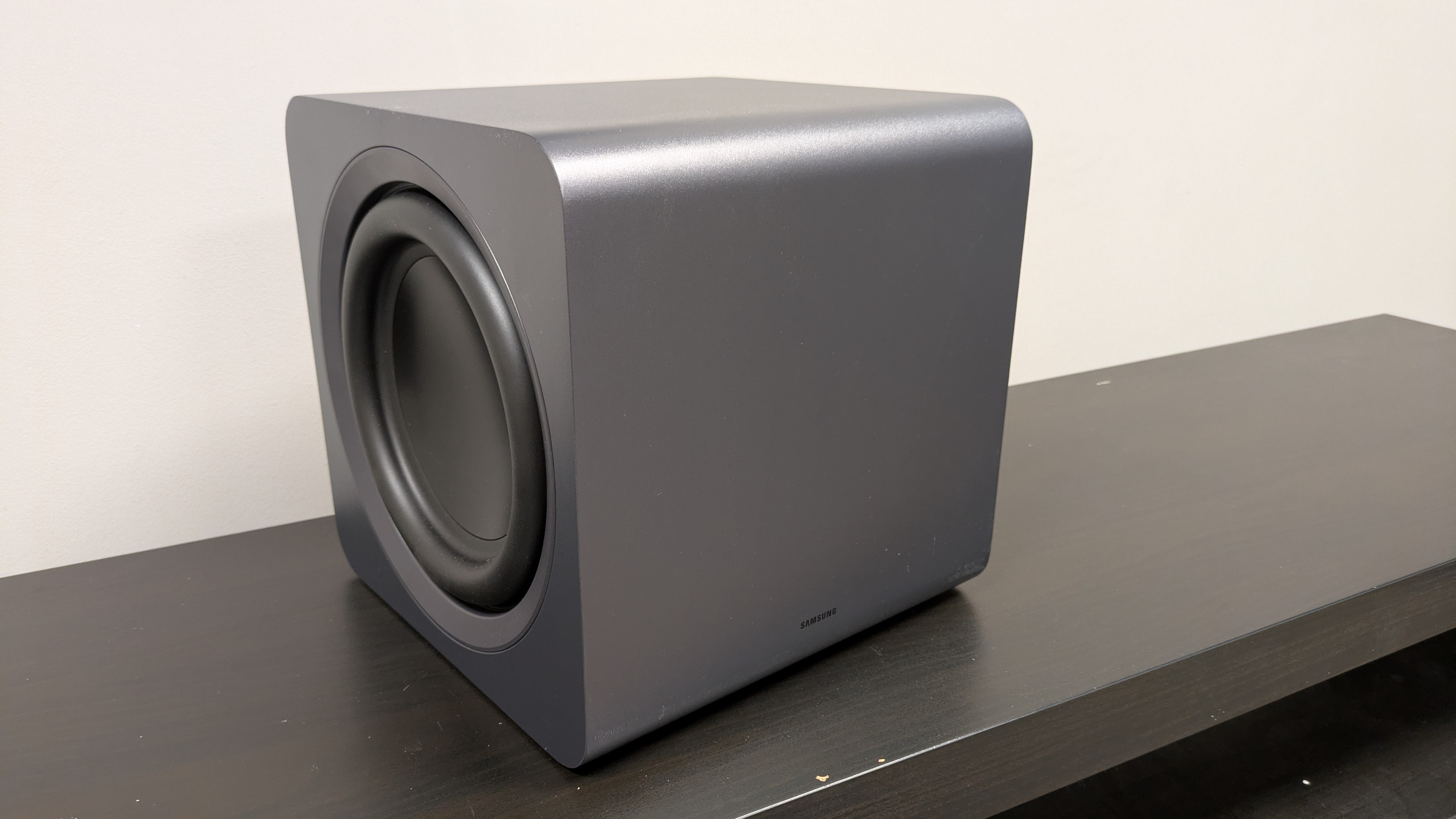 Samsung HW-Q990H subwoofer on dark bench