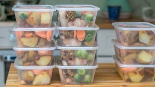 11 plastic containers filled with food for storage