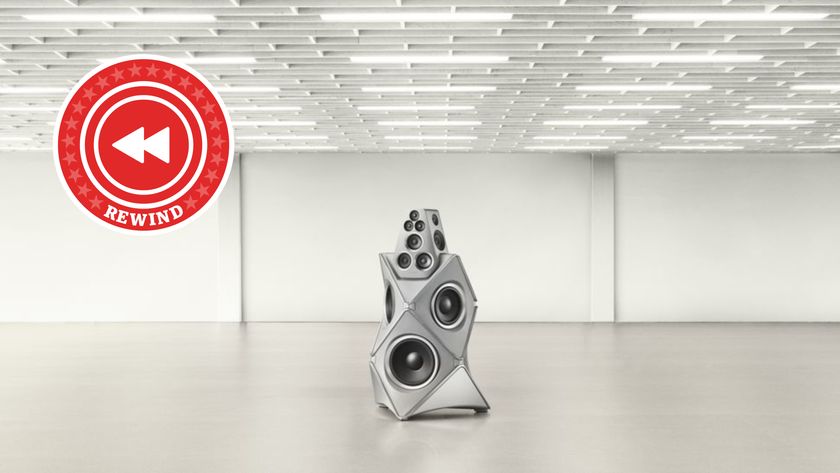 Bang and Olufsen speaker in empty room with Rewind logo