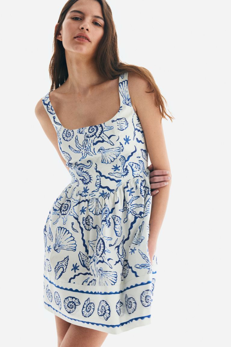 Dress With Flared Skirt