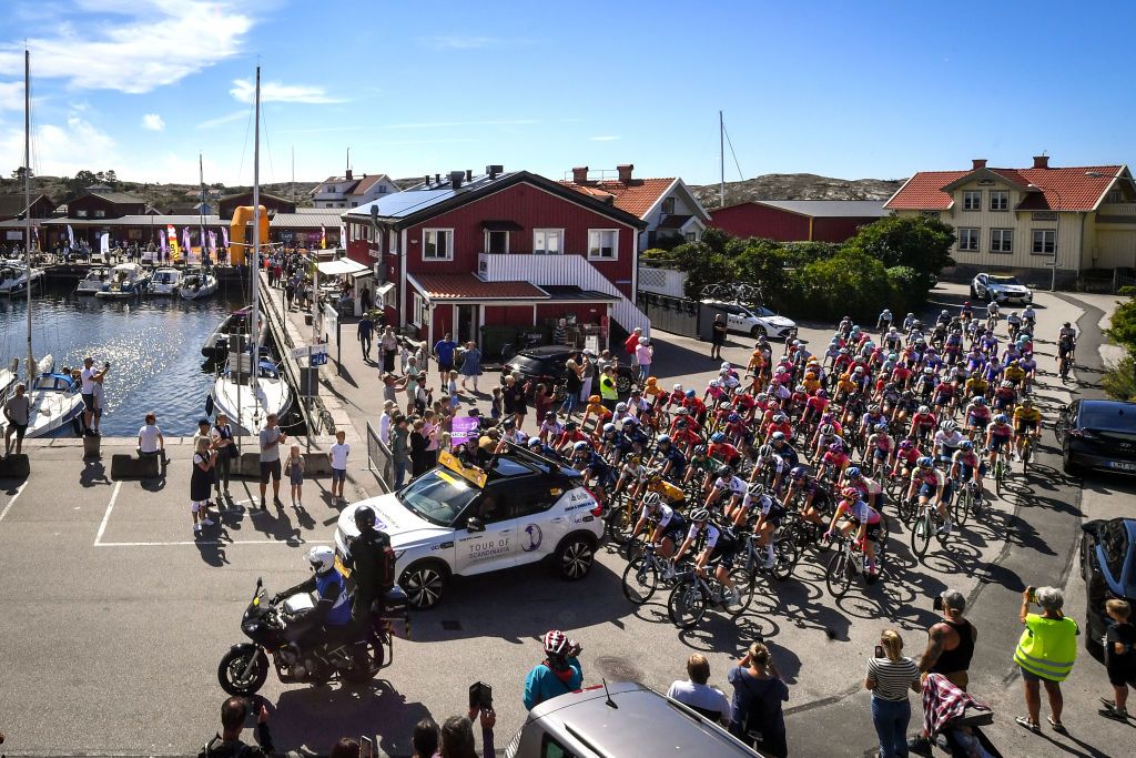 STROMSTAD SWEDEN AUGUST 10 Marianne Vos of Netherlands and Jumbo Visma Team Yellow Leader Jersey Alison Jackson of Canada and Team Liv Racing Xstra Green Points Jersey Amber Kraak of Netherlands and Jumbo Visma Team Queen of the mountains jersey Megan Jastrab of United States and Team DSM White Best Young Jersey and a general view of the peloton at Orust Village prior to the 8th Tour of Scandinavia 2022 Battle Of The North Stage 2 a 1538km stage from Orust to Strmstad UCIWWT tourofscandinavia TOSC22 on August 10 2022 in Stromstad Sweden Photo by Luc ClaessenGetty Images