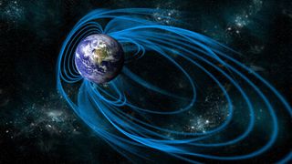 Earth’s magnetic field protects us from the solar wind by deflecting the charged particles.