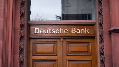 Deutsche Bank sign over door at building entrance