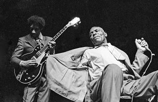 Hubert Sumlin and Howlin' Wolf onstage.