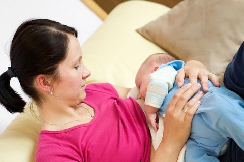 Woman Breast Feeding