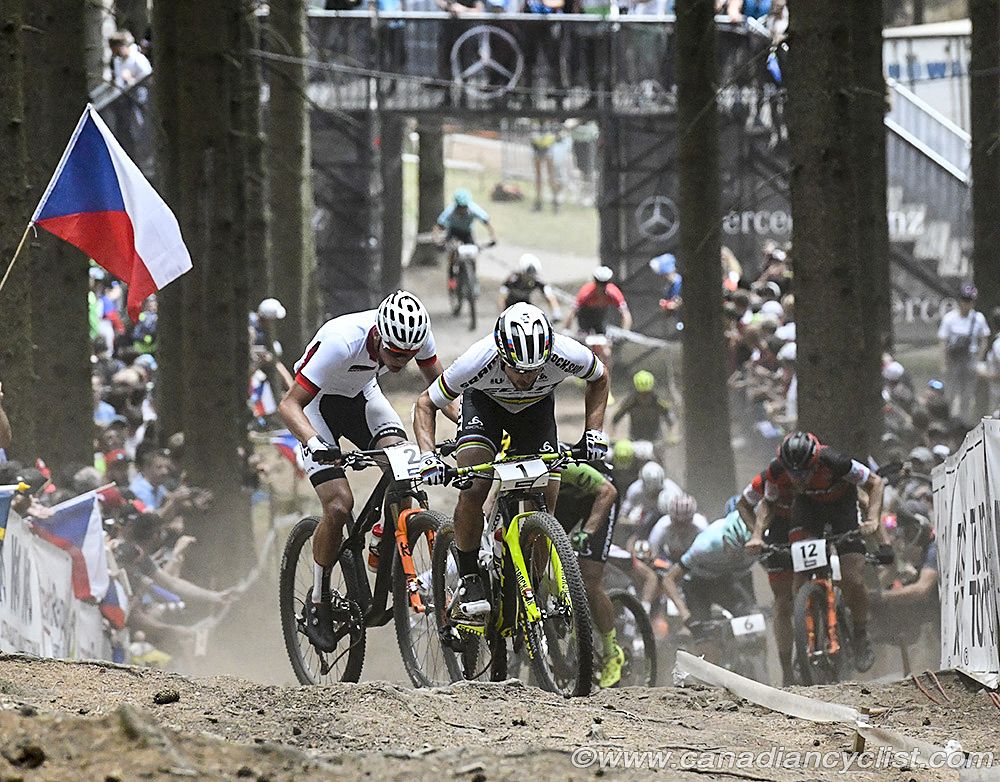 Nino Schurter (Scott-SRAM) and Mathieu van der Poel (Corendon-Circus) at the front on the long climb