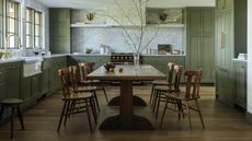 kitchen with large dining table in the middle