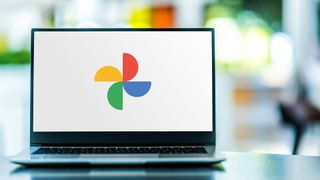 Google Photos logo displayed on a laptop