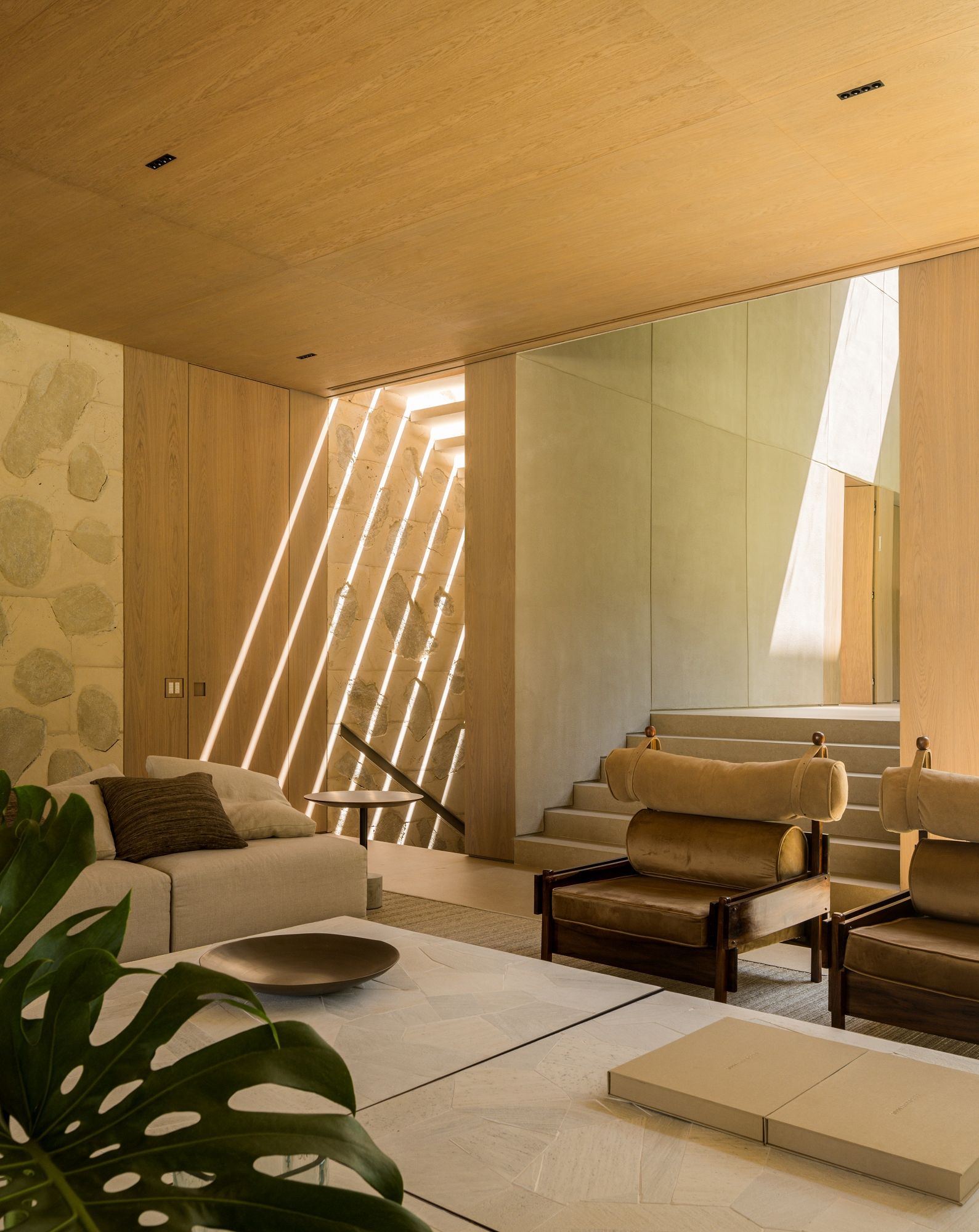 Pacaembu House interior with warm colours and soft furnishings