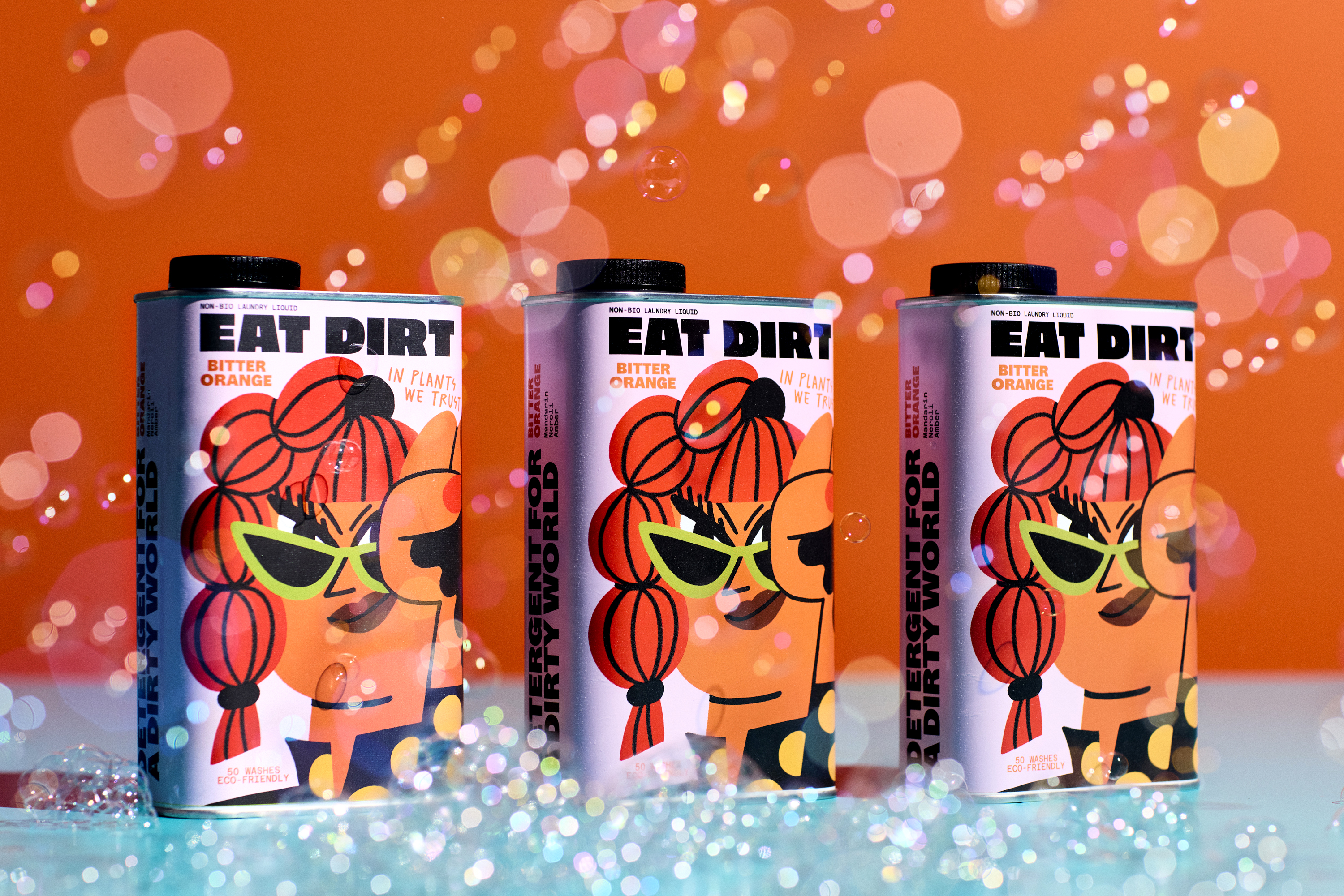 Eat Dirt laundry detergent in an illustrated tin