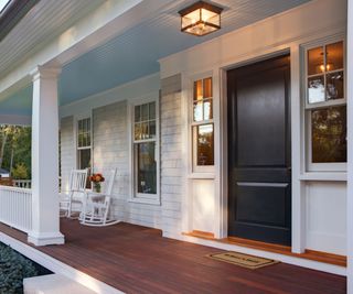 A porch light on a new-build home