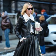 New York Fashion Week street style. Showgoer wears a circle skirt.