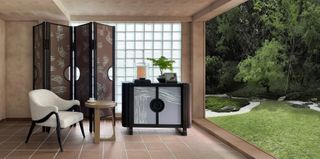 A living room space with furniture by Andre Fu, facing a traditional japanese zen garden with bamboo plants