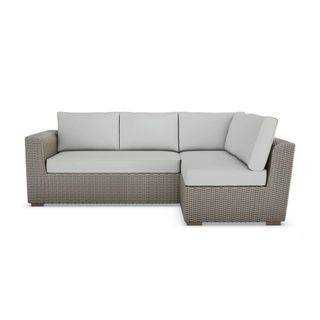 A rattan outdoor corner sofa