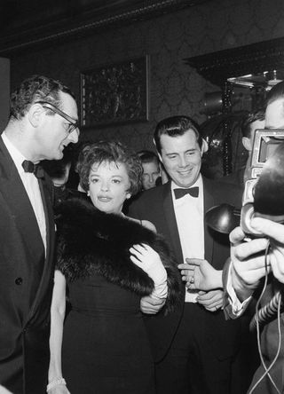 Actors Dirk Bogarde and Judy Garland at the premiere of the 1963 film I Could Go On Singing at the Plaza Theatre in London.