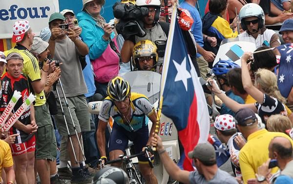Lance Armstrong (Astana) spies a Texas flag on the Col de la Colombi&egrave;re.