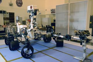 The next time the Curiosity Mars Science Laboratory be in this same configuration — wheels deployed and remote sensing mast and instrument-tipped arm extended — will be after it is deposited on the surface of Mars in August 2012.