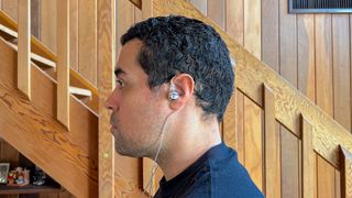 EarFun EH100 wired in-ears being worn by reviewer