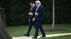 Marco Rubio and Donald Trump walk at the White House