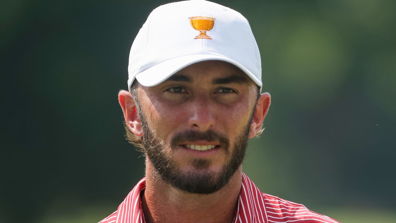 Max Homa looks on during a 2022 Presidents Cup practice round at Quail Hollow